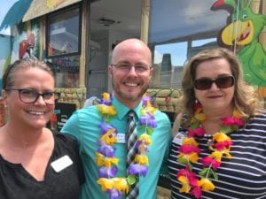 Kim Layton, (left) Derek Burton (middle), from Meadow Brook Assisted Living and Memory Care); and Bridget Wetterer, (right) from Home Services Unlimited.